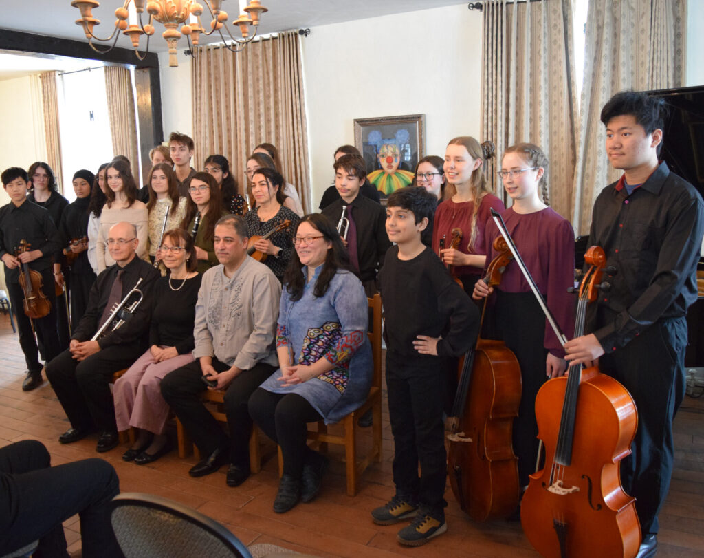 Live youth orchestra performing Peter and the Wolf for children and families